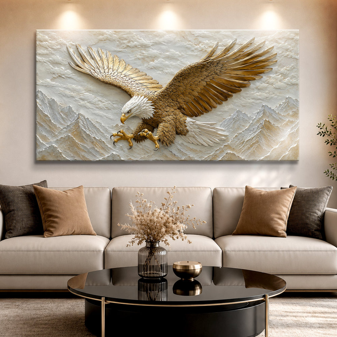 Quadro Águia Dourada acima do sofá com almofadas marrons e mesa preta redonda