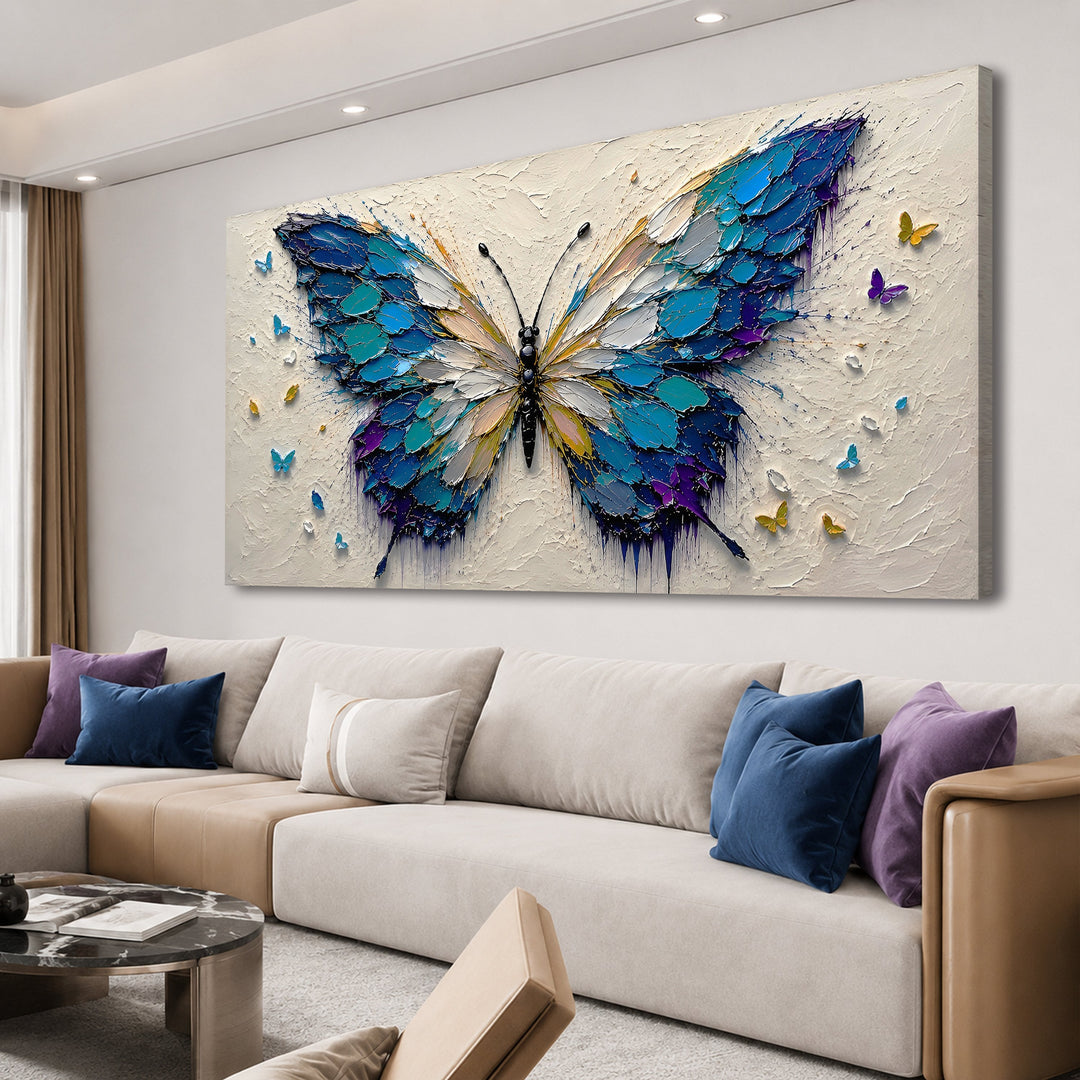 Quadro Asas da Liberdade em vista angulada, acima do sofá bege