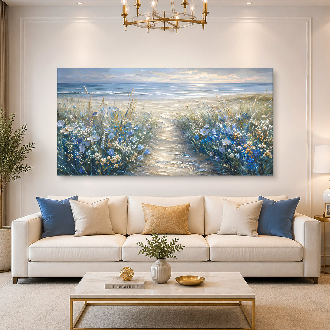 Quadro Caminho para o Mar em sala clara com sofá bege e mesa de centro