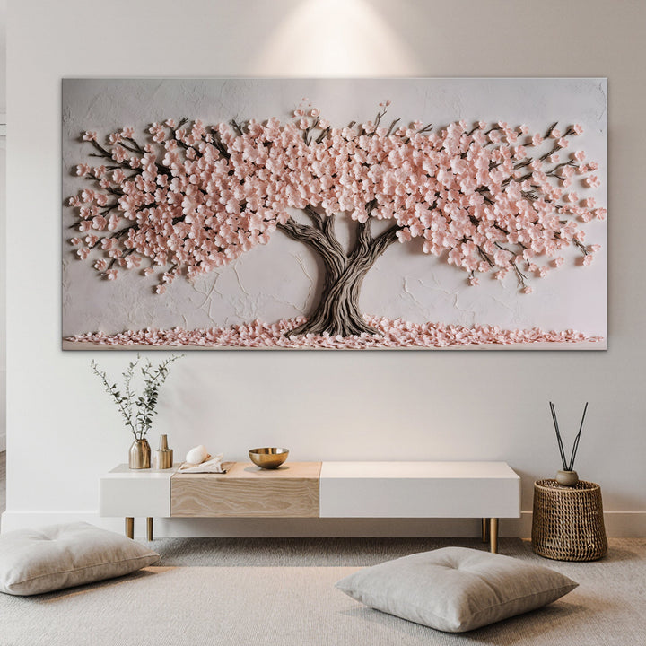Quadro Cerejeira em Flor acima de rack baixo branco, em sala clara com almofadas no chão