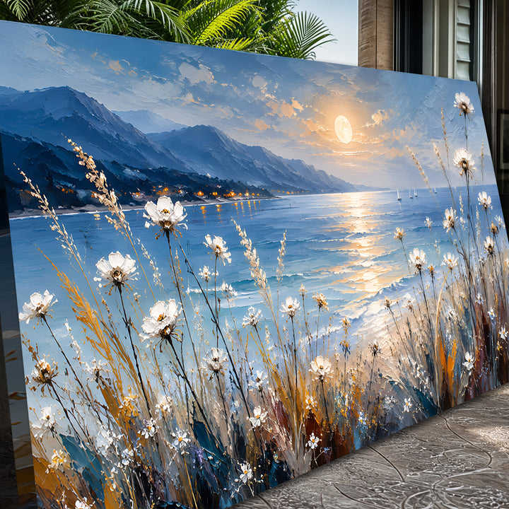 Quadro Luar à Beira-mar em ângulo próximo, com flores brancas e a lua sobre o mar