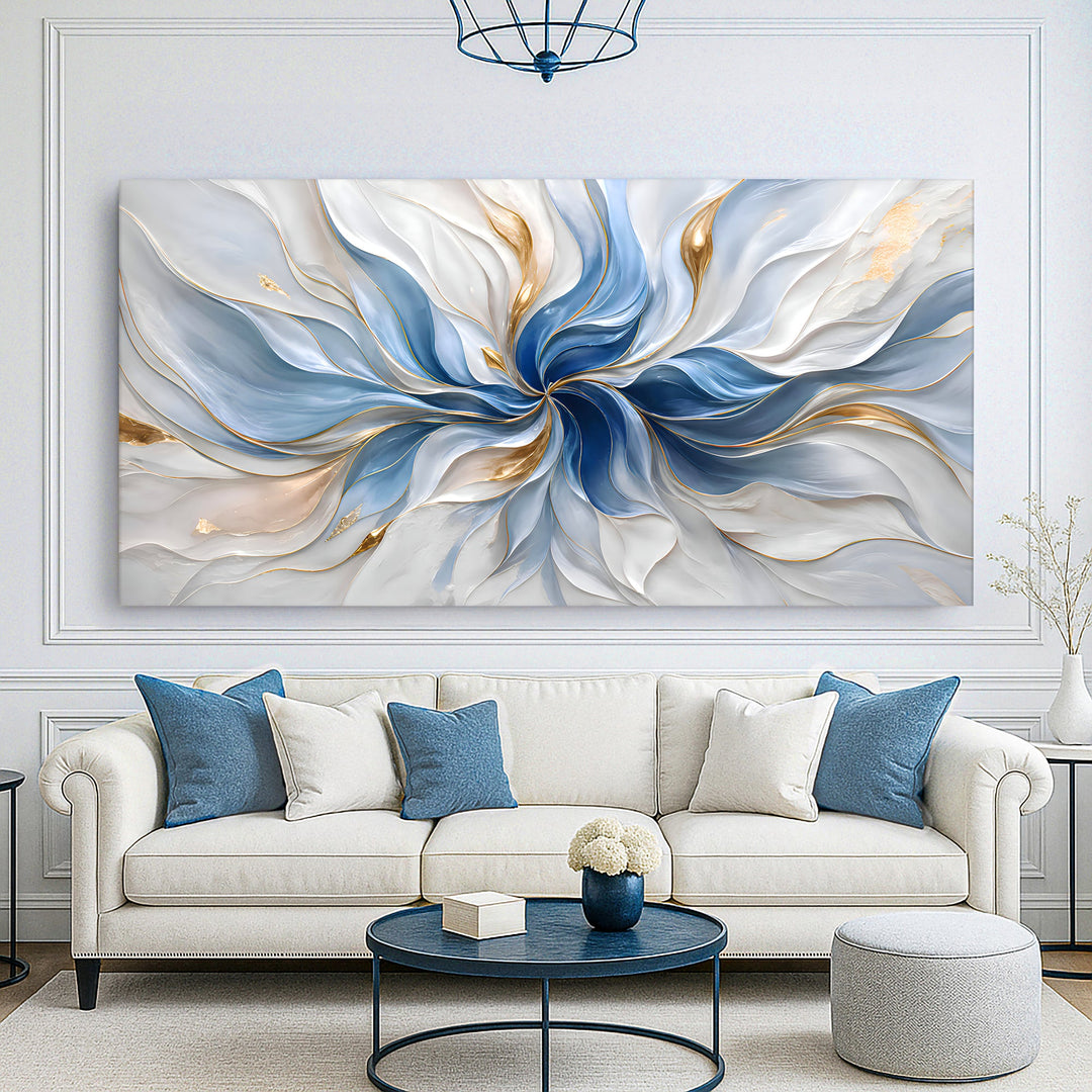 Quadro Sinfonia Azul acima de sofá branco capitonê com almofadas azuis e mesa de centro azul redonda